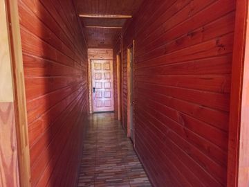 Nogales, en venta parcela plana de 5000 mts con casa sólida y urbanización completa.