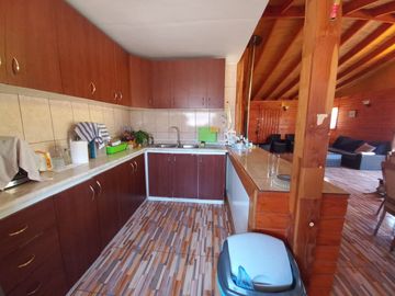 Nogales, en venta parcela plana de 5000 mts con casa sólida y urbanización completa.