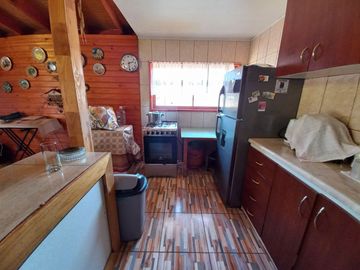 Nogales, en venta parcela plana de 5000 mts con casa sólida y urbanización completa.