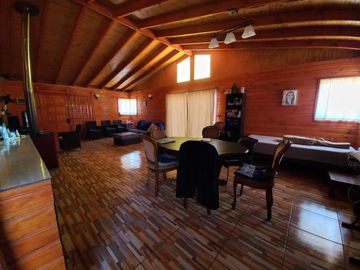 Nogales, en venta parcela plana de 5000 mts con casa sólida y urbanización completa.