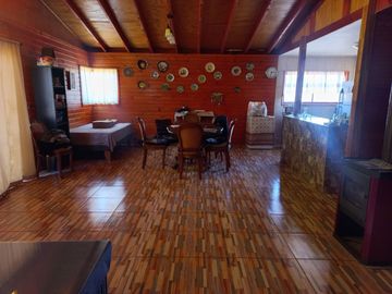 Nogales, en venta parcela plana de 5000 mts con casa sólida y urbanización completa.