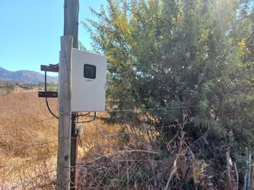 Nogales, en venta parcela plana de 5000 mts con casa sólida y urbanización completa.