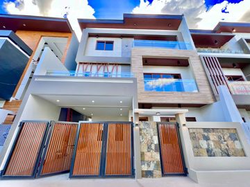 Experience modern living at its finest in this brand new house and lot nestled within the prestigious Greenwoods Executive Village