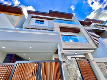 Experience modern living at its finest in this brand new house and lot nestled within the prestigious Greenwoods Executive Village