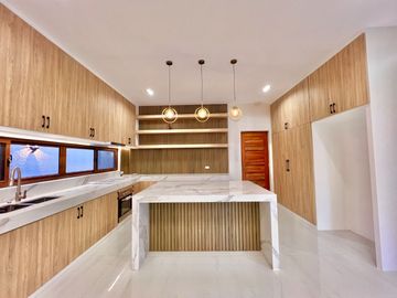 Experience modern living at its finest in this brand new house and lot nestled within the prestigious Greenwoods Executive Village