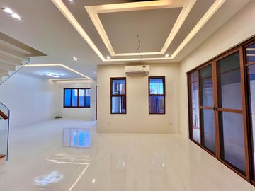 Experience modern living at its finest in this brand new house and lot nestled within the prestigious Greenwoods Executive Village