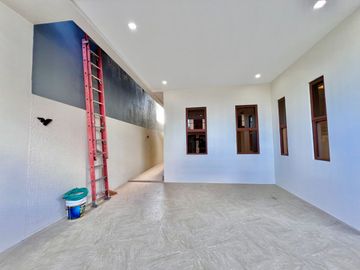 Experience modern living at its finest in this brand new house and lot nestled within the prestigious Greenwoods Executive Village