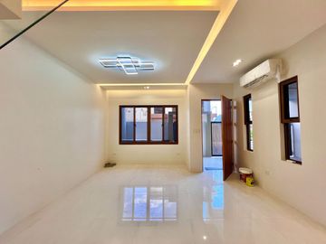 Experience modern living at its finest in this brand new house and lot nestled within the prestigious Greenwoods Executive Village