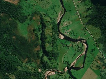 Campo entre Coyhaique y Puerto Aysén con impresionante vista panorámica