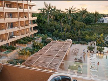 Condominio con terraza privada, en venta, Frente al mar, Puerto Morelos.