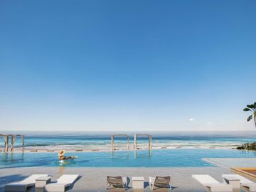 Condominio con terraza privada, en venta, Frente al mar, Puerto Morelos.