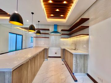 Embrace the charm of modern living in this brand new single detached house and lot nestled within the prestigious Greenwoods Executive Village
