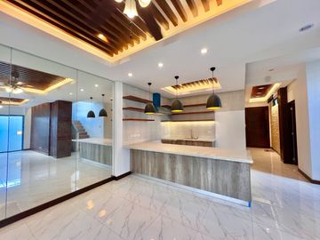 Embrace the charm of modern living in this brand new single detached house and lot nestled within the prestigious Greenwoods Executive Village