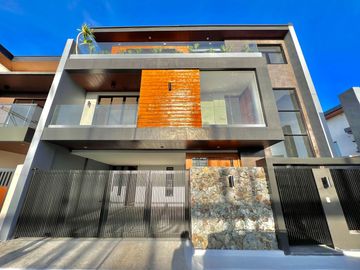 Experience grandeur in this brand-new house and lot with high ceilings, nestled in the exclusive Greenwoods Executive Village