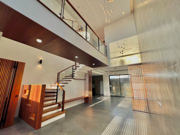 Experience grandeur in this brand-new house and lot with high ceilings, nestled in the exclusive Greenwoods Executive Village