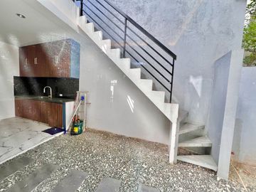 Experience modern comfort in this brand new house and lot, boasting a spacious living area, nestled within the serene surroundings of Greenwoods Execu