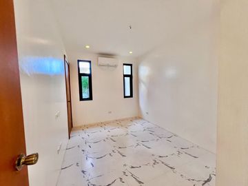 Experience modern comfort in this brand new house and lot, boasting a spacious living area, nestled within the serene surroundings of Greenwoods Execu
