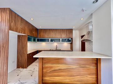 Experience modern comfort in this brand new house and lot, boasting a spacious living area, nestled within the serene surroundings of Greenwoods Execu