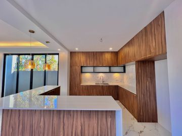 Experience luxury living in this brand new, three-story house and lot nestled within the prestigious Greenwoods Executive Village