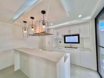 Discover the epitome of modern living in this brand-new three-story house and lot, set on a spacious lot perfect for your family's needs