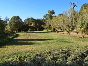 EXTRANJERO POR VIAJE VENDE CASA FRENTE A LAGUNA TORCA - MARAVILLOSO TERRENO