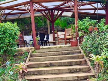 EXTRANJERO POR VIAJE VENDE CASA FRENTE A LAGUNA TORCA - MARAVILLOSO TERRENO