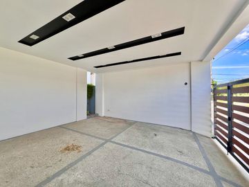 Experience modern comfort in this brand new house and lot, boasting a spacious living area, nestled within the serene surroundings of Greenwoods Execu