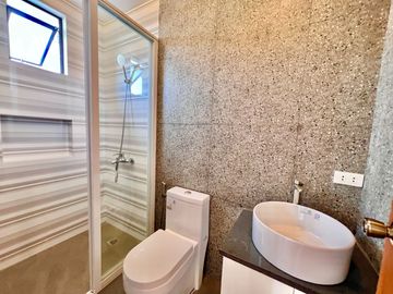Experience modern comfort in this brand new house and lot, boasting a spacious living area, nestled within the serene surroundings of Greenwoods Execu