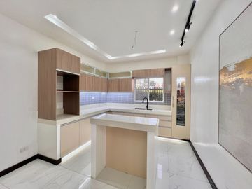 Indulge in modern luxury with this brand new, spacious corner house and lot nestled in the prestigious Greenwoods Executive Village