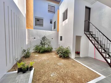 Indulge in modern luxury with this brand new, spacious corner house and lot nestled in the prestigious Greenwoods Executive Village