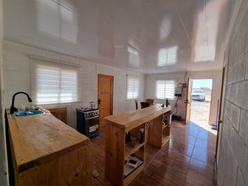 Vendo Casa Solida 100 mts2 con Terreno de 5.000 mts2 a 5 minutos de La Huayca. Autosustentable Posee paneles Soleres y Agua de Pozo con bomba.