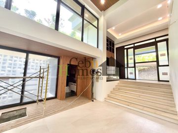 Modern Elegance: Newly Constructed 10-Bedroom Home for Sale in Maria Luisa Estate Park