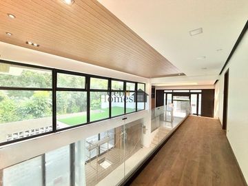 Indulge in the pinnacle of modern living with this newly constructed, six-story architectural masterpiece nestled in the exclusive Maria Luisa Estate