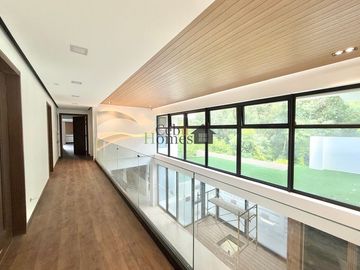 Indulge in the pinnacle of modern living with this newly constructed, six-story architectural masterpiece nestled in the exclusive Maria Luisa Estate
