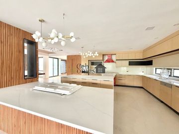 Indulge in the pinnacle of modern living with this newly constructed, six-story architectural masterpiece nestled in the exclusive Maria Luisa Estate