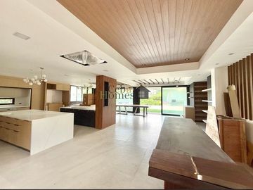 Indulge in the pinnacle of modern living with this newly constructed, six-story architectural masterpiece nestled in the exclusive Maria Luisa Estate