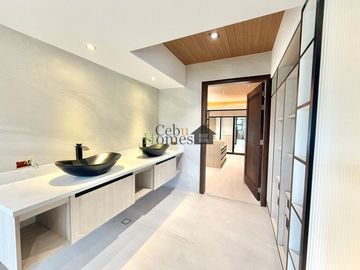 Indulge in the pinnacle of modern living with this newly constructed, six-story architectural masterpiece nestled in the exclusive Maria Luisa Estate