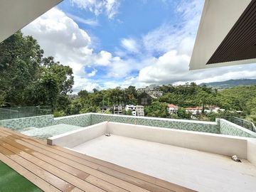 Indulge in the pinnacle of modern living with this newly constructed, six-story architectural masterpiece nestled in the exclusive Maria Luisa Estate