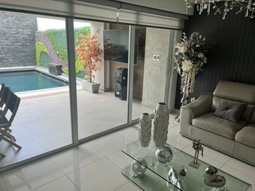 RESIDENCIA EN VENTA EN ISLA MUSULA, CON ALBERCA PROPIA DE 3 NIVELES, 3 RECAMARAS, GYM Y ROOF GARDEN
