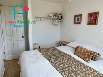Departamento en renta vacacional con balcón y vista a las áreas comunes