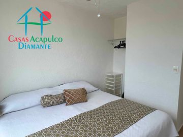 Departamento en renta vacacional con balcón y vista a las áreas comunes
