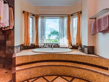 Exquisite Home with Grand Features and Outdoor Bliss in Maria Luisa Park
