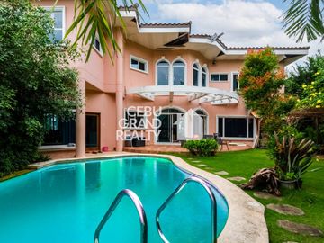 Exquisite Home with Grand Features and Outdoor Bliss in Maria Luisa Park