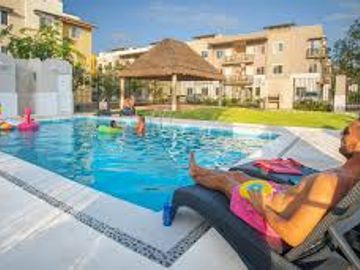 DEPARTAMENTO EN VENTA DE 2 HABITACIONES BODEGA PRIVADA EN  PLAYA DEL CARMEN