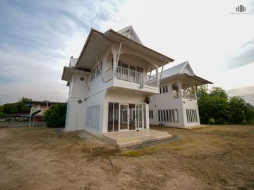 Proven Opportunity! Earn 1 Million THB Monthly!    For Sale! Developed Land with a Home Café   Located on Phetkasem Road, Tha Yang, Phetchaburi. Perfe