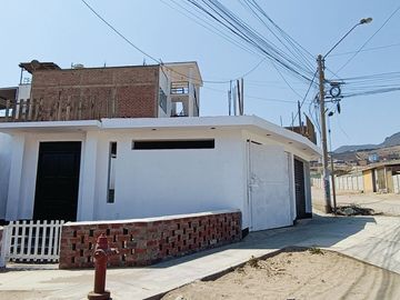 SE VENDE CASA CON ESTACIONAMIENTO Y LOCAL COMERCIALEN LADERAS DE PACHACAMAC