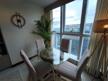 2BR condo at Uptown Parksuites Tower 1 - High floor unit with city view