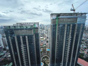 2BR condo at Uptown Parksuites Tower 1 - High floor unit with city view