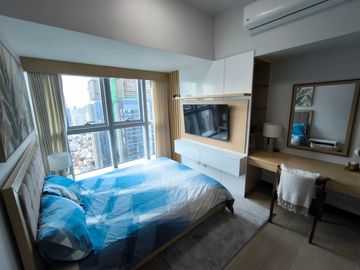 2BR condo at Uptown Parksuites Tower 1 - High floor unit with city view