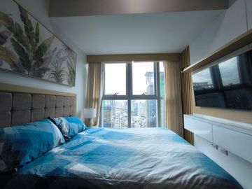 2BR condo at Uptown Parksuites Tower 1 - High floor unit with city view